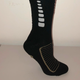 A Myant sock with knit heated zones, pressure sensors and stretch sensors. (Battery not pictured.)